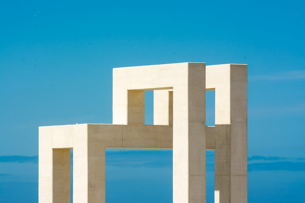 Mastering the First Impression: Your intriguing post title goes here Concrete sculpture in Le Havre, France, under a clear blue sky, showcasing modern design.